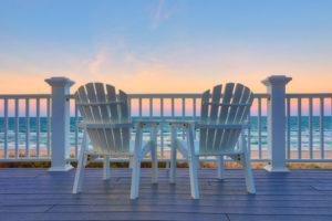 Enjoy the view of the ocean from a chair while on vacation